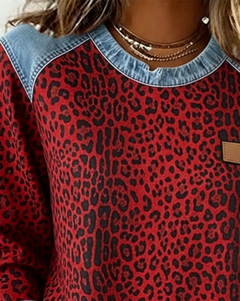 Zefirina | Sudadera con estampado de leopardo y detalles patchwork en denim