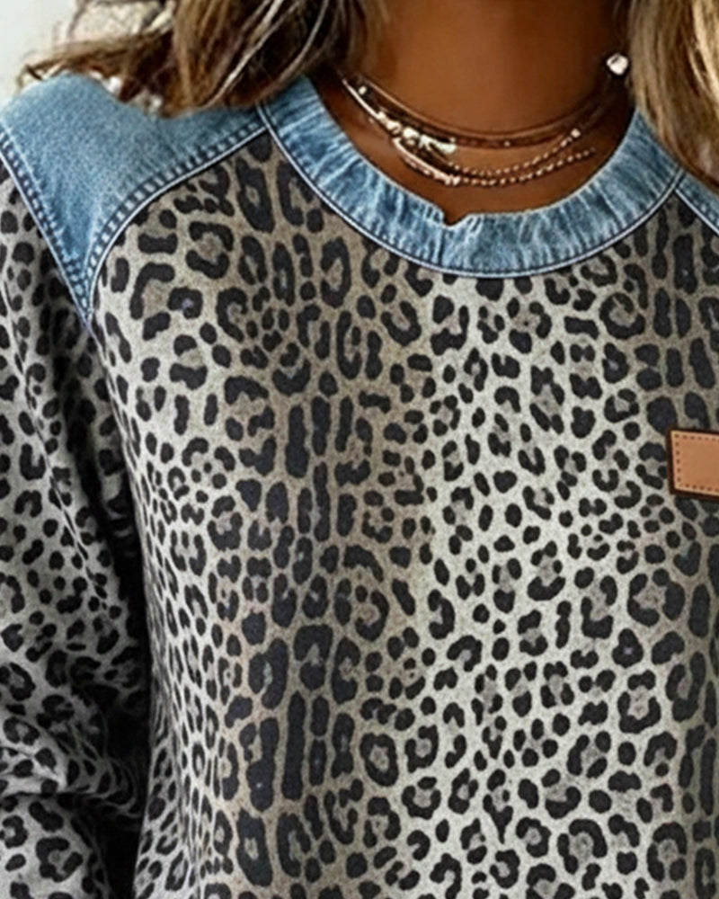 Zefirina | Sudadera con estampado de leopardo y detalles patchwork en denim