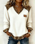 Thaïs | Top de manga larga con estampado de leopardo, cuello en V y diseño patchwork